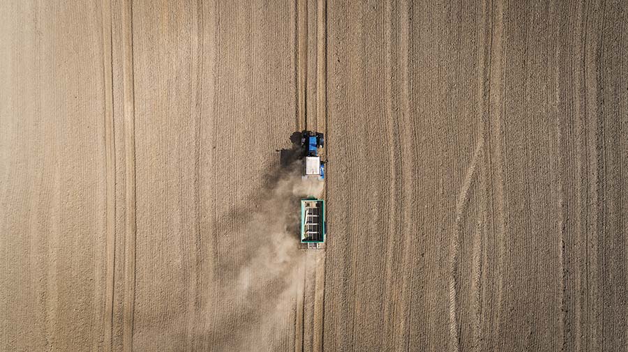 Tractor in wheat field